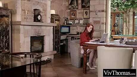 Gorgeous lesbian licks boss's pussy in office