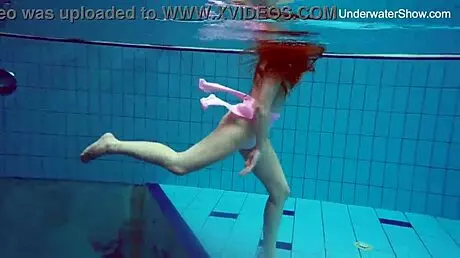 Simonna Hot and Horny Smoking in Public Swimming Pool with Juicy Big Ass Tits