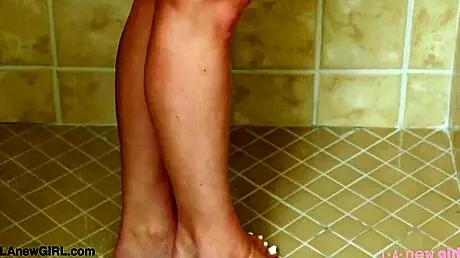 Teen Blonde Model Strips Down for a Steamy Shower in Solo Action.