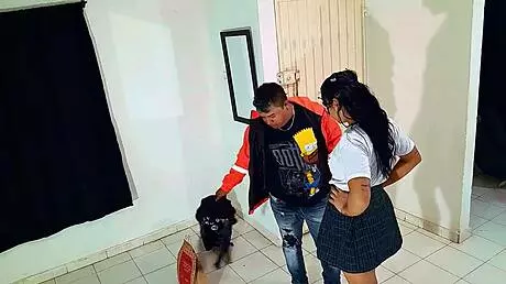 Young student in college uniform gives a blowjob to unknown delivery man.