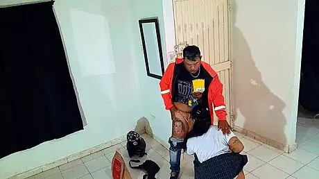 Young student in college uniform gives a blowjob to unknown delivery man.
