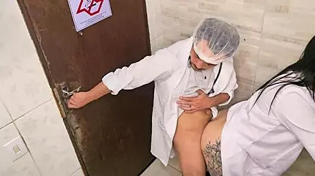 doctor and nurse can't resist and fuck in the hospital bathroom during the shift